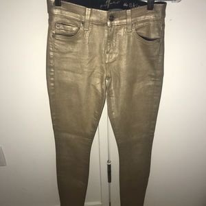 Metallic gold coated skinny jeans